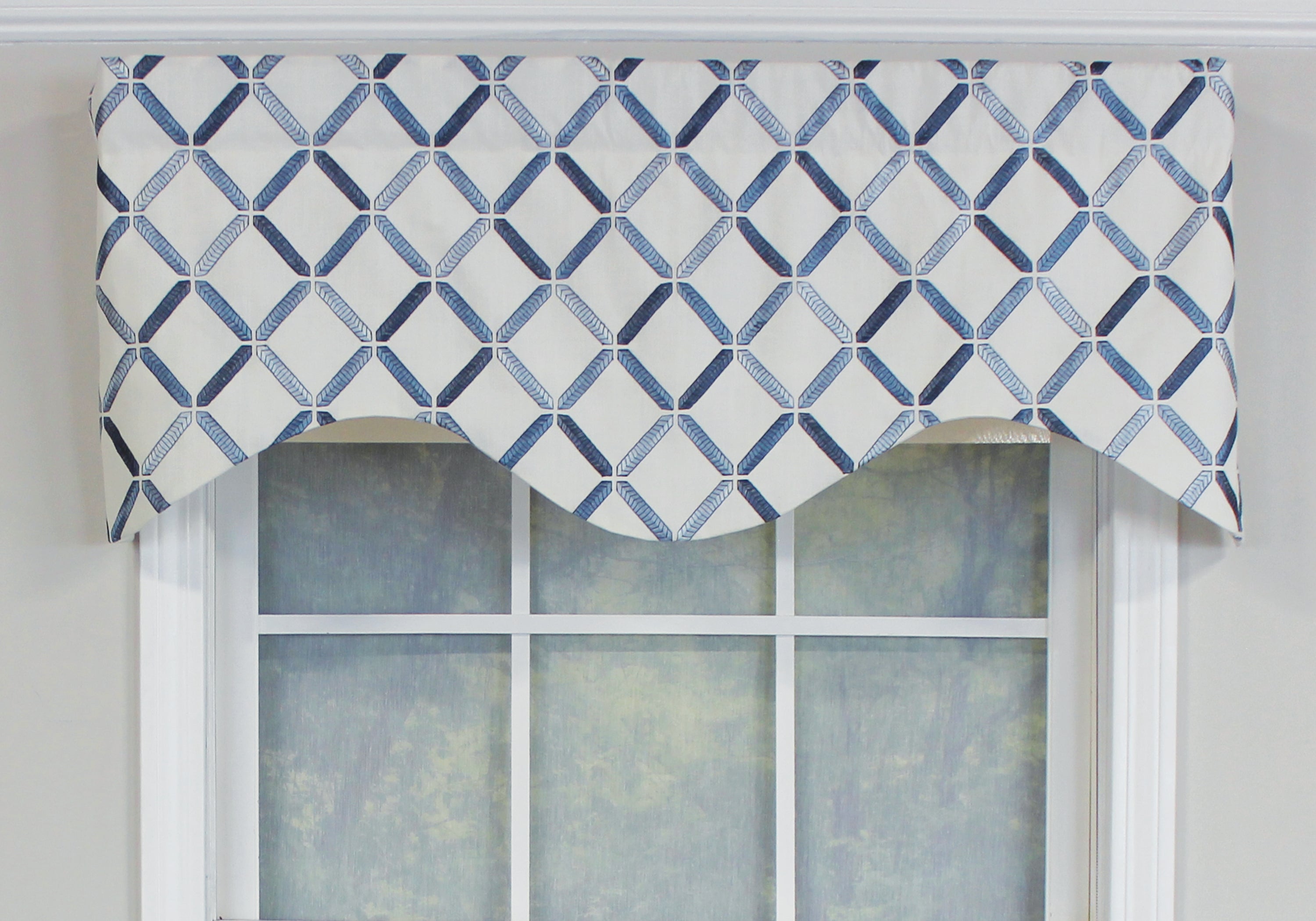 Our Granville Cornice Valance is part of our newest collection! We love our Granville Cornice Valance for its beautiful geometric embroidery pattern on a neutral background. This valance comes in either a silver metallic or marine blue embroidery makes this valance really pop! It fits a window up to 48"wide when flat, gather for smaller windows or add multiples for larger windows!