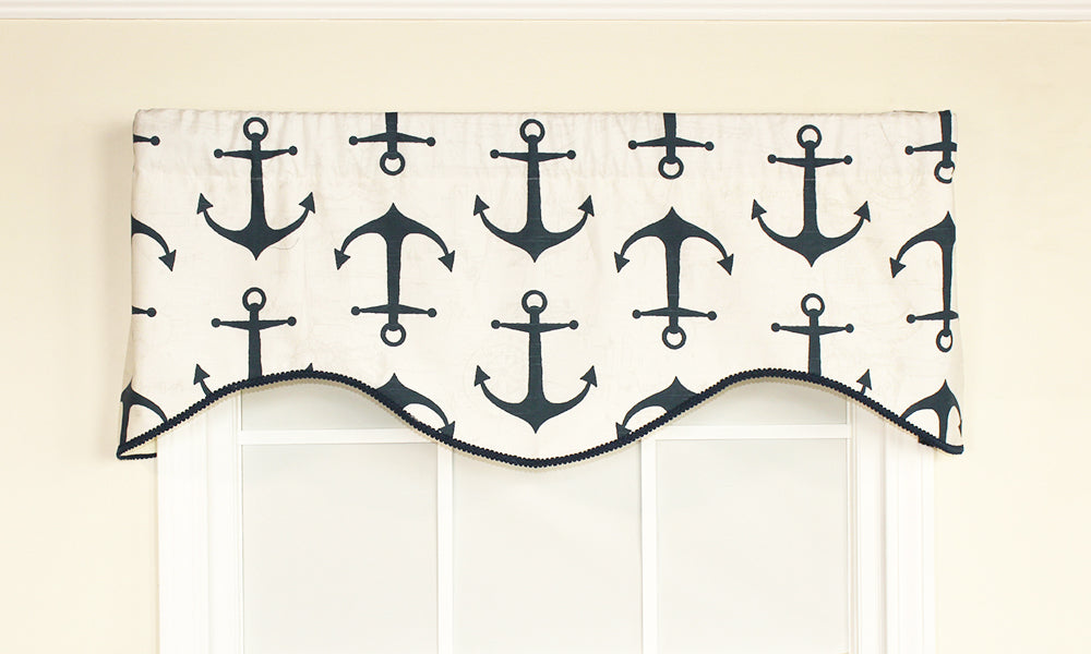 Our Castaway Cornice Valance features anchors in navy on a crisp white background. It is finished with a coordinating navy trim. This maritime-themed window treatment is perfect addition to add to your nautical decor!
