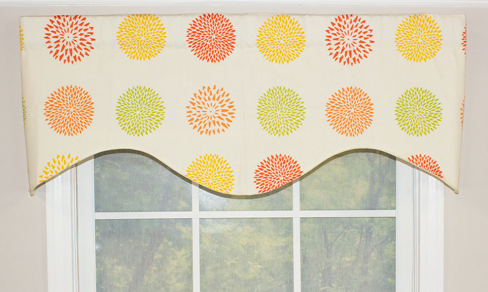 The Floral Burst Cornice Valance is a playful window treatment! This window treatment features colorful floral pattern in yellow, green and orange coral on a white background.