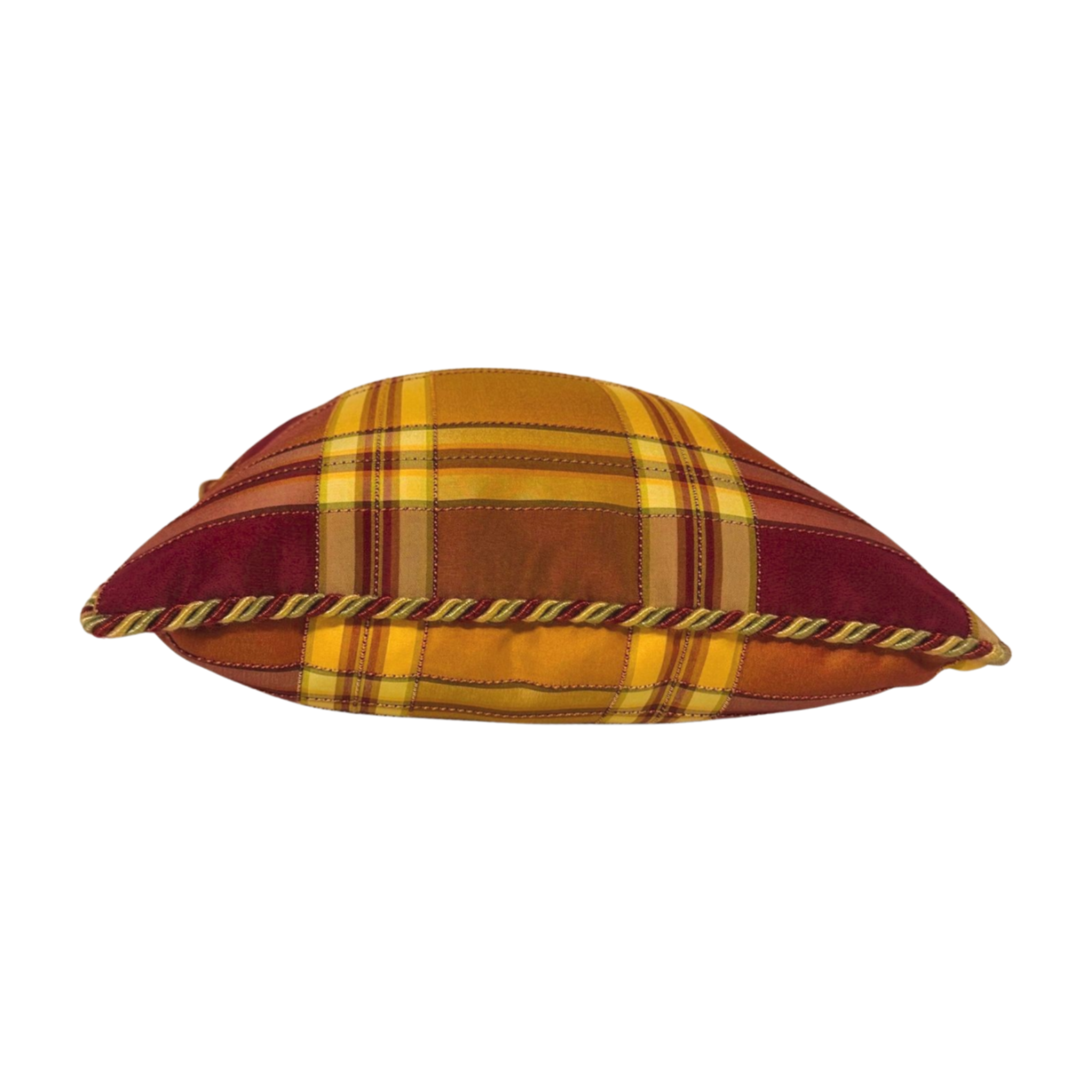 Our Golden Plaid Throw Pillow features a beautiful silk plaid with red, green and gold. It has the same fabric on the front and back and finished with an elegant corded trim.