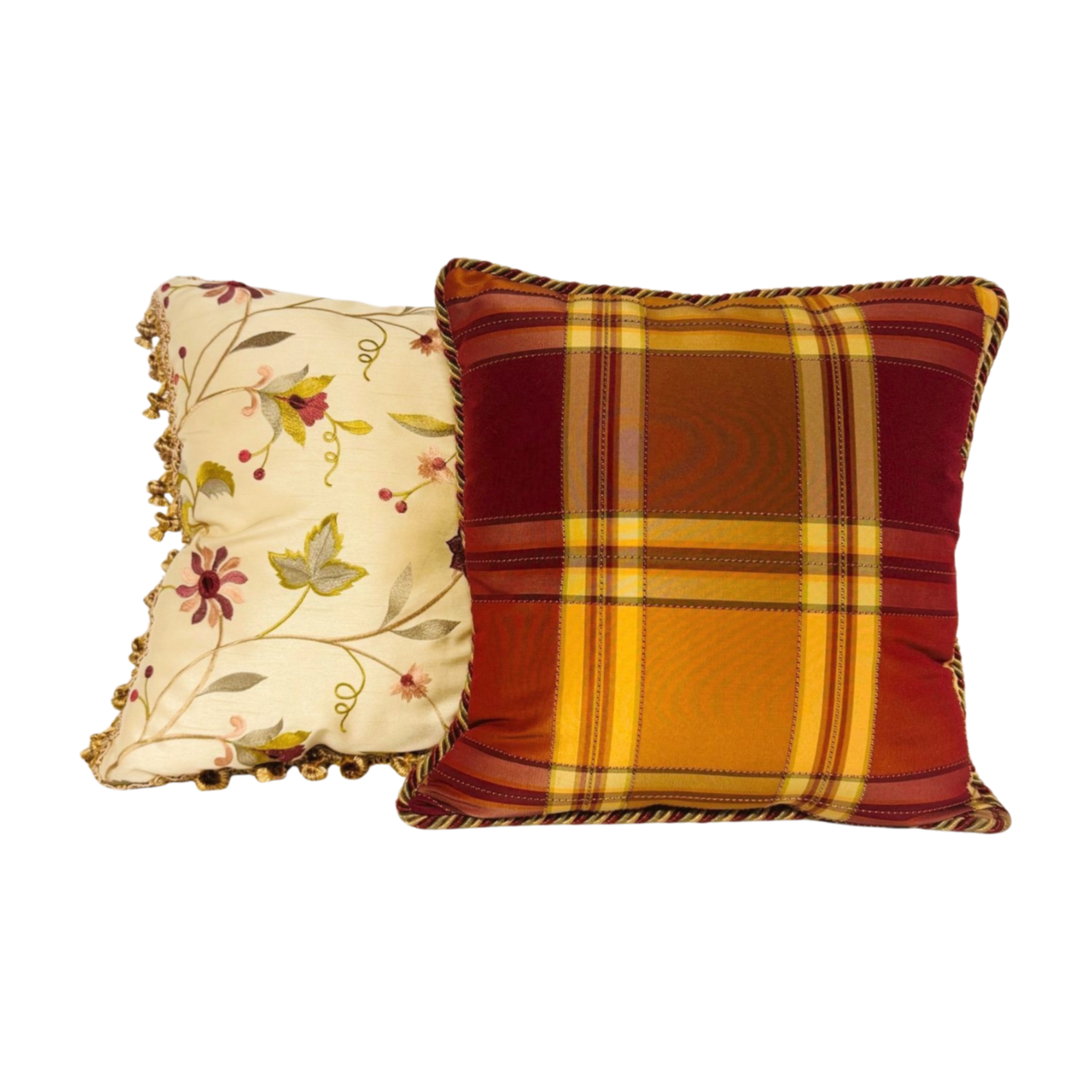 Decorative pillow with floral embroidery and gold tassels on a gold background. Holiday throw pillow