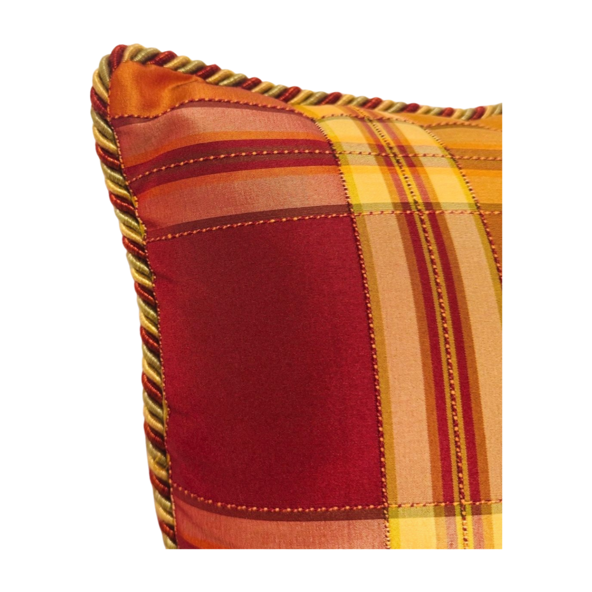 Our Golden Plaid Throw Pillow features a beautiful silk plaid with red, green and gold. It has the same fabric on the front and back and finished with an elegant corded trim
